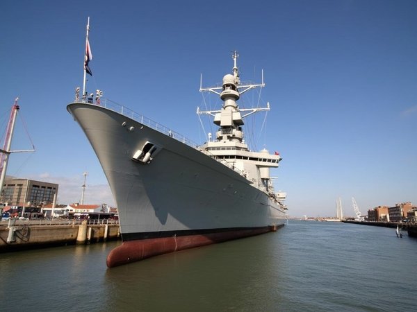 Which cruises offer the most comprehensive tours of the UK's naval bases?